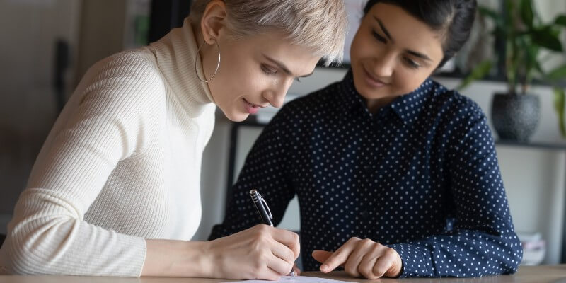 Two Women Working Together